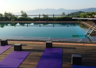 Yoga in Italy - Practice outdoors by the pool