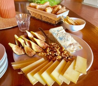 Yoga in Italy Cheese board with fresh pecorino, gorgonzola, sun-ripened figs and walnuts